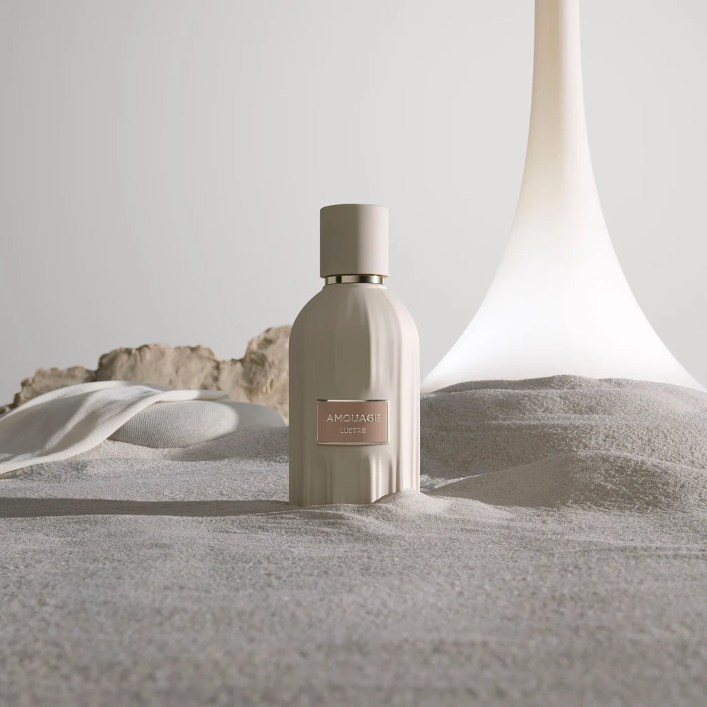 Amouage Lustre bottle in sand