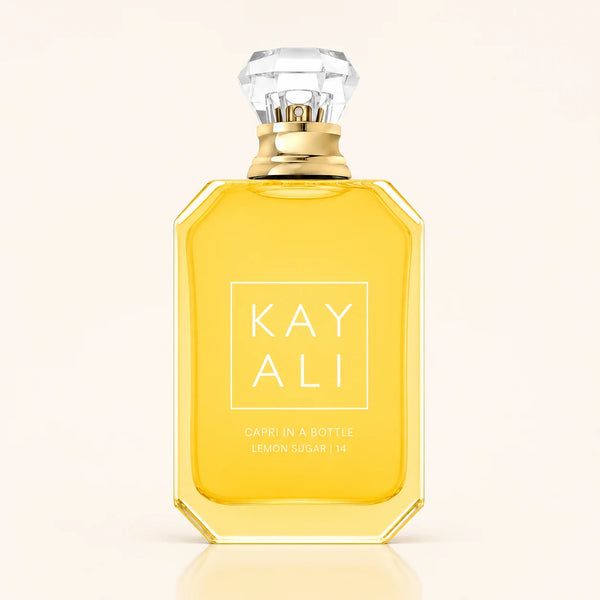 KAYALI Capri in a Bottle Lemon Sugar 14 EDP bottle on ivory background